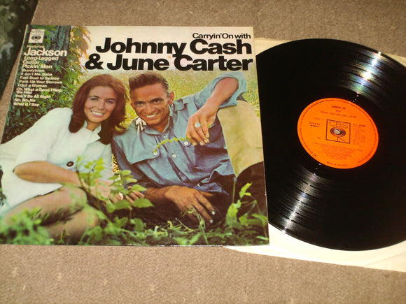 Johnny Cash And June Carter - Carryin On With